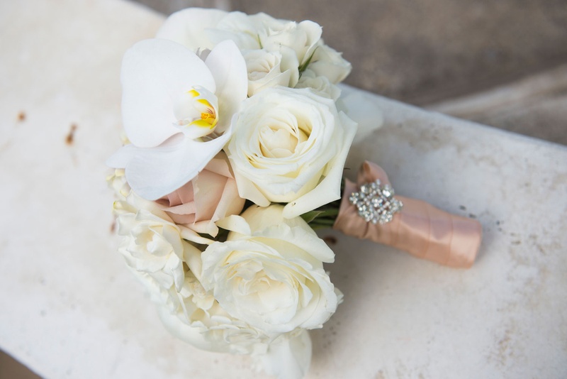 Orchid and Rose Bridesmaid Bouquet
Photography: Boyd Harris Photographs
Read More:
http://www.insideweddings.com/weddings/a-jeweled-floral-wedding-at-fairmont-grand-del-mar-in-san-diego/745/ Bridesmaid bouquet with orchids and roses, wrapped with a blush ribbon and embellished with a jewel