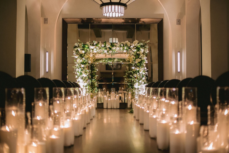 Candlelit Fall Wedding Ceremony
Photography: Maya Myers Photography
Read More:
http://www.insideweddings.com/weddings/candlelit-jewish-ceremony-unique-cozy-outdoor-reception-in-la/1346/ wedding ceremony hotel figueroa candles along aisle black guest chairs greenery white flower chuppah