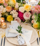 Elegant Place Setting with Blue Accents
Photography: Ashley Paige Photography
Read More:
http://www.insideweddings.com/weddings/romantic-ocean-view-ceremony-charming-reception-in-california/1337/ wedding guest place setting intricate charger plate with menu light blue napkin tied sprig of greens