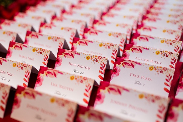 romantic wedding filled with red roses and gold details inside