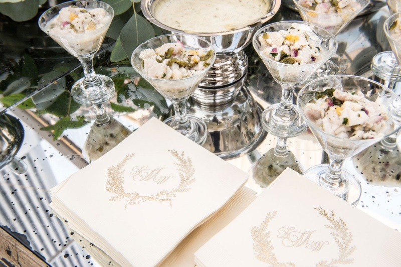 Monogram Napkins Next to Appetizers
Photography: Carasco Photography
Read More:
http://www.insideweddings.com/weddings/traditional-ceremony-glamorous-garden-inspired-tented-reception/943/ Wedding cocktail hour monogram beverage napkins next to hors d'oeuvres in cocktail glasses