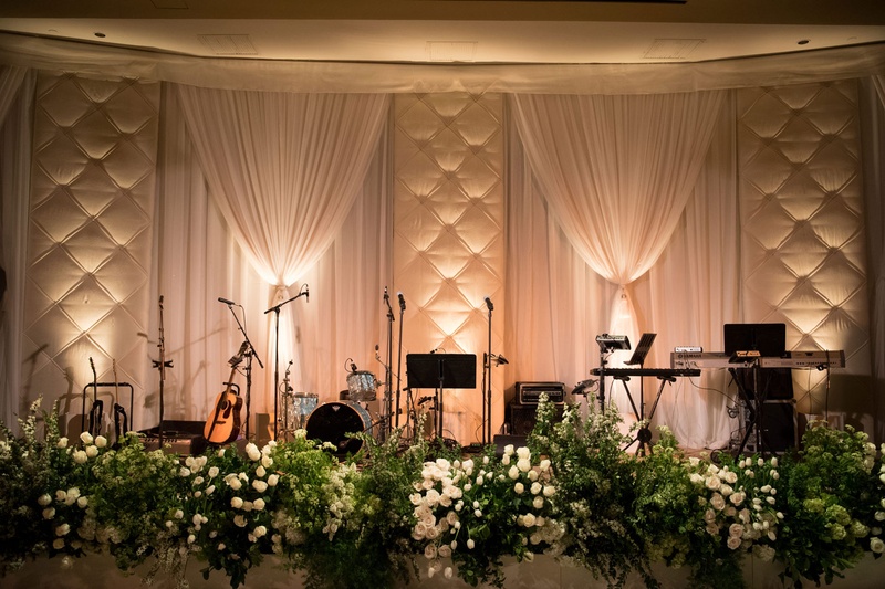 Tufted Wall %26 Drapery Behind Band
Photography: John Solano Photography
Read More:
http://www.insideweddings.com/weddings/an-opulent-garden-ceremony-ballroom-reception-in-beverly-hills/986/ live band stage greenery along edge with drapes curtains and tufted panel wall behind performers