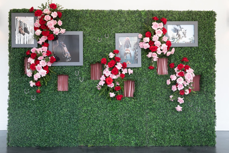 Photo and Champagne Wall
Photography: Collin Pierson Photography
Read More:
http://www.insideweddings.com/weddings/equestrian-themed-bridal-shower-inspired-by-the-kentucky-derby/1326/ boxwood hedge wall will red and pink roses, photos of horses, windows for hands to serve champagne