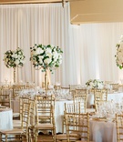 Classic White Wedding Reception
Photography: Chard Photo
Read More:
http://www.insideweddings.com/weddings/alfresco-ceremony-on-the-coast-classic-ballroom-reception/1290/ the resort at pelican hill wedding reception with gold chiavari chairs, tall white centerpieces