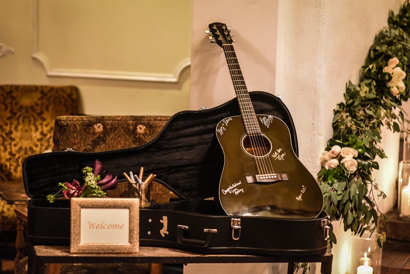 Guitar as Guest Book
Photography: Joe Photo
Read More:
http://www.insideweddings.com/weddings/the-unique-and-intimate-wedding-of-trains-bassist-hector-maldonado/879/ hector maldonado train wedding fender guitar guest book metallic signatures