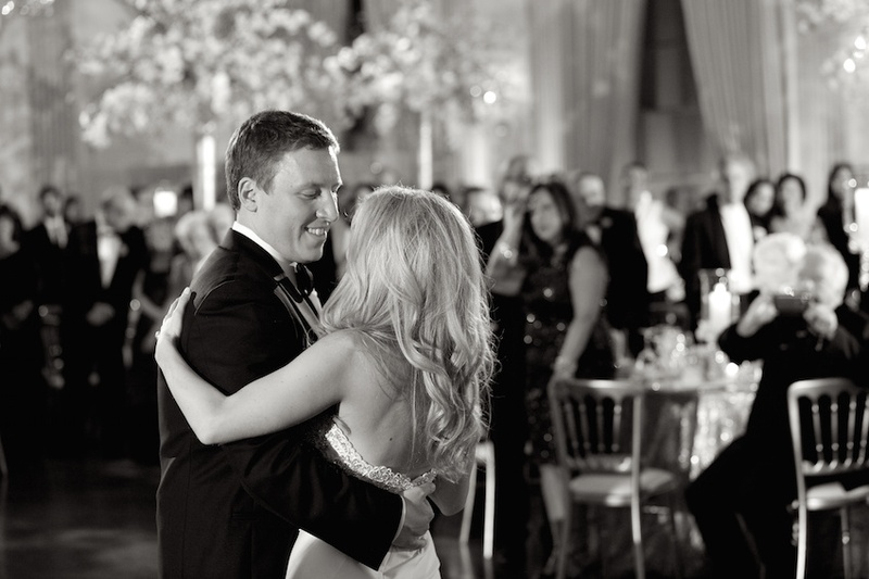 Newlyweds Take the Dance Floor
Photography: Bob %26 Dawn Davis Photography
Read More:
http://www.insideweddings.com/weddings/glamorous-ivory-blush-spring-wedding-at-a-private-club-in-chicago/685/ Black and white photo of groom in tuxedo dancing with bride in a strapless dress