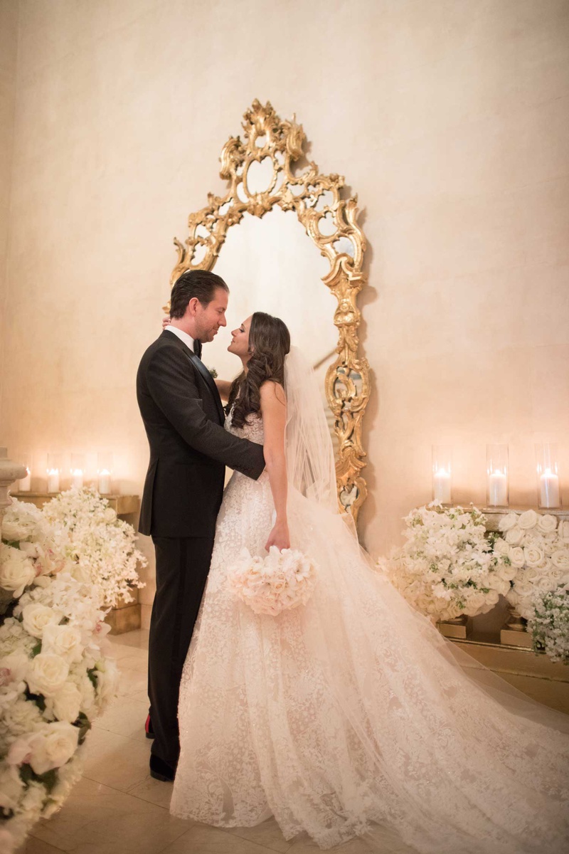 Bride %26 Groom in Front of Gold Mirror
Photography: The Day by Ira Lippke
Read More:
http://www.insideweddings.com/weddings/opulent-luxury-wedding-with-timeless-color-palette-in-new-york-city/1199/ wedding portrait bride and groom long hair gold mirror white flowers candles the plaza hotel