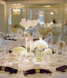 White Single Flower-Type Arrangements
Photography: Michelle Beller Photography
Read More:
http://www.insideweddings.com/weddings/classic-ceremony-beachfront-ballroom-reception-in-santa-monica/1234/ wedding reception white flower centerpiece rose hydrangea orchid napkin gold ring hotel casa del mar