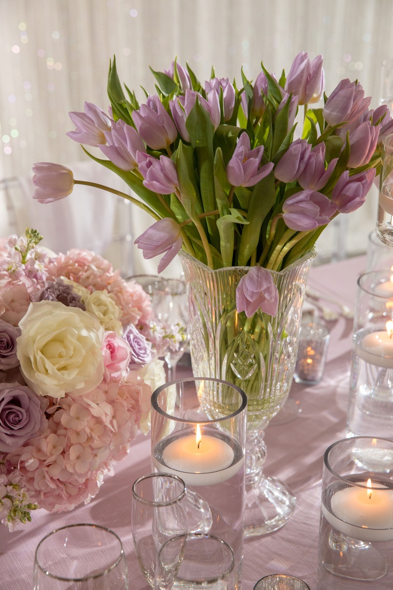 Reception Décor Photos Purple Tulips in Crystal Vase Inside Weddings