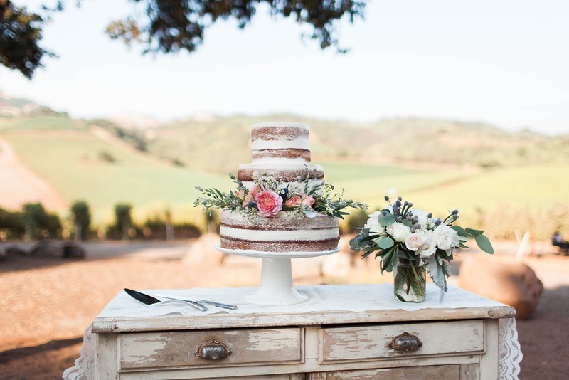 3-Tiered Naked Cake with Fresh Flowers
Photography: Katie Shuler Photography
Read More:
http://www.insideweddings.com/weddings/rustic-chic-outdoor-wedding-at-a-winery-in-northern-california/945/ 3 three tier naked wedding cake fresh flowers pink blue purple green natural