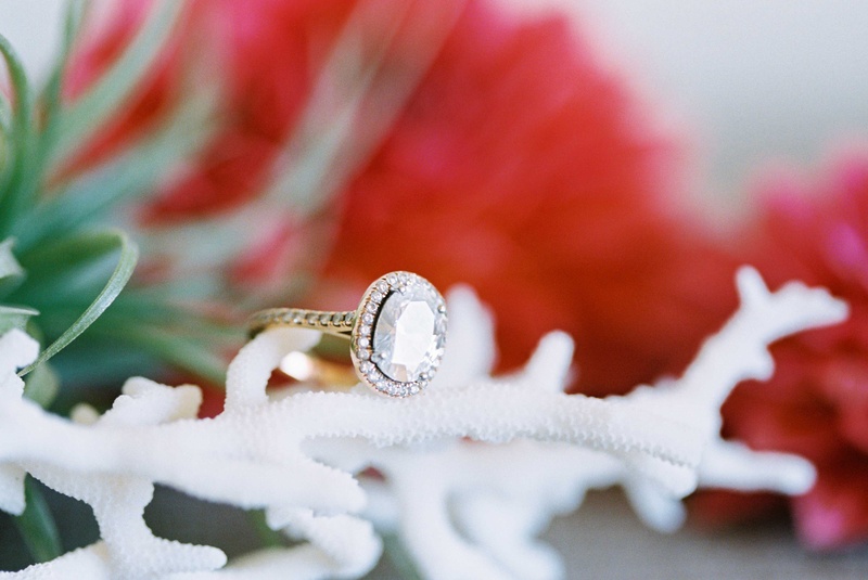 Oval Heirloom Diamond Ring
Photography: Braedon Photography
Read More:
http://www.insideweddings.com/weddings/orthodox-jewish-wedding-with-outdoor-ceremony-inspired-by-the-sea/812/ Joseph Shabani designed oval cut engagement ring with halo and pave yellow gold band on white coral