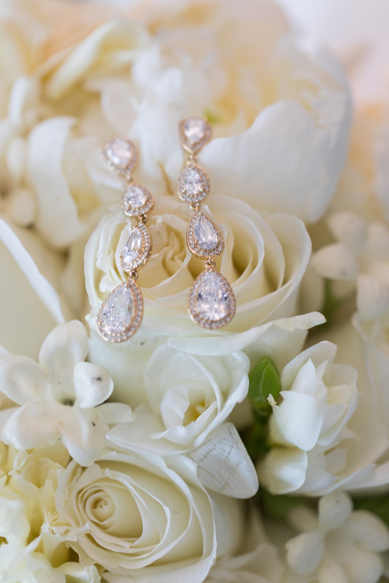 Pear-Shaped Halo Earrings
Photography: Kristin Anderson
Read More:
http://www.insideweddings.com/weddings/classic-wedding-colors-with-modern-elements-in-santa-monica/1031/ pear-shaped crystals with halo earrings, nadri earrings for wedding