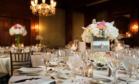 Floral Décor
Photography: STAK Photography
Read More:
http://www.insideweddings.com/weddings/new-york-country-club-wedding-incorporating-chinese-customs/426/ Wedding reception centerpiece of white, pink, and orange flowers in a cube vase with a brooch