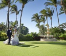 Couple Walking Through Palm Trees
