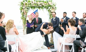 Groom Dips Bride at Ceremony
Photography: George Street Photo %26 Video
Read More:
http://www.insideweddings.com/weddings/high-school-sweethearts-wed-in-romantic-ceremony-on-a-yacht/883/ bride in allure ball gown, groom in navy joseph abboud suit, dipped for first kiss as husband wife