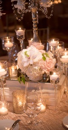 Candlelit Floral Centerpiece on Table
Photography: Boyd Harris Photographs
Read More:
http://www.insideweddings.com/weddings/a-jeweled-floral-wedding-at-fairmont-grand-del-mar-in-san-diego/745/ Rose and orchid jeweled centerpiece with candles at blush wedding reception