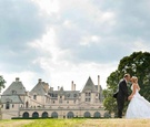 Bride and Groom Kiss at Oheka Castle