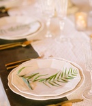 White Charger Plates, Sprig of Greenery
Photography: Brian Leahy Photography
Read More:
http://www.insideweddings.com/weddings/rustic-chic-engagement-party-inspiration-at-a-california-farmhouse/935/ white charger plates sprig greenery wood table faux wedding party styled shoot rustic event gold