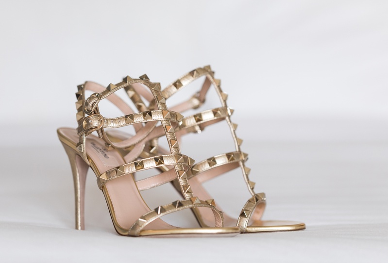 Gold-Studded Sandals
Photography: Kristin Anderson
Read More:
http://www.insideweddings.com/weddings/classic-wedding-colors-with-modern-elements-in-santa-monica/1031/ Valentino bridal shoes with gold straps and gold studs