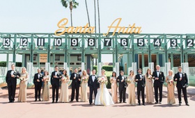 Wedding Party at Santa Anita Race Track
Photography: Lucas Rossi Photography
Read More:
http://www.insideweddings.com/weddings/traditional-catholic-ceremony-reception-at-a-california-racetrack/1139/ Wedding party bridesmaids in gold sequin dresses and groomsmen in suits at santa anita racetrack