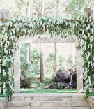 Arch with Wisteria and Greenery
Photography: This Modern Romance
Read More:
http://www.insideweddings.com/weddings/rustic-chic-wedding-with-wooden-accents-and-verdant-details/861/ calamigos ranch wedding, wooden ceremony arch with wisteria greenery