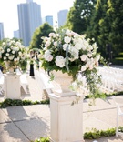 Chicago Ceremony Flower Arrangements
Photography: Averyhouse
Read More:
http://www.insideweddings.com/weddings/chic-summer-wedding-at-a-natural-history-museum-in-chicago/1361/ outdoor wedding ceremony white risers and urns field museum ceremony white greenery arrangements