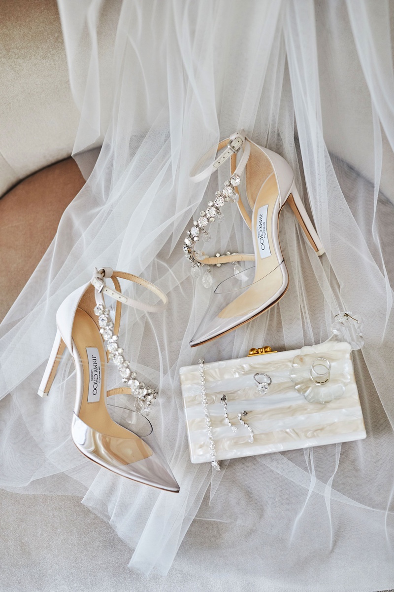 Modern Heels %26 Box Clutch
Photography: Christian Oth Studio
Read More:
http://www.insideweddings.com/weddings/traditional-cathedral-wedding-luxury-reception-in-new-york-city/1331/ wedding accessories veil and jimmy choo heels clear toe with jewel strap mother of pearl clutch