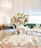Soft Blush and Ivory Centerpiece
Photography: Jenny Quicksall Photography
Read More:
http://www.insideweddings.com/weddings/romantic-wedding-with-blush-and-ivory-decor-in-malibu-california/1146/ calamigos ranch tented wedding reception, clear chiavari chairs, blush and ivory centerpieces