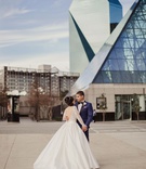 Dallas Couple Outside Wedding Venue
Photography: Shaun Menary Photography
Read More:
http://www.insideweddings.com/weddings/multicultural-wedding-with-a-winter-wonderland-theme-in-dallas/1126/ Wedding venue in Dallas Texas bride in low back long sleeve ball gown groom in navy tuxedo