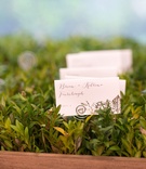 Calligraphy Escort Cards with Leaf Motif
Photography: Images by Berit, Inc.
Read More:
http://www.insideweddings.com/weddings/tented-backyard-wedding-with-equestrian-details-at-a-family-farm/931/ Planter box with greenery and escort cards leaf design hand drawn calligraphy