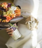 Fall Wedding Bouquet
Photography: Melissa Mermin | Love Stories
Read More:
http://www.insideweddings.com/weddings/fall-country-club-wedding-in-naples-florida/347/ Bride holding purple, green, and orange autumn flowers