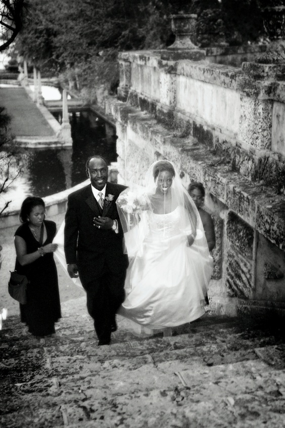 Miami Museum Wedding Ceremony
Photography: LaCour Photography
Read More:
http://www.insideweddings.com/weddings/fall-wedding-at-the-vizcaya-museum-and-gardens-in-miami-florida/218/ Black and white picture of father of bride walking bride up stairs