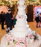 Towering Seven-Tier Cake
Photography: Perez Photography
Read More:
http://www.insideweddings.com/weddings/church-ceremony-classic-country-club-reception-with-pink-palette/1284/ white wedding cake with seven tiers with fresh flowers