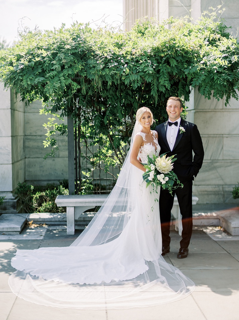 Molly Weisman %26 Justin Volk
Photography: Lauren Gabrielle Photography
Read More:
http://www.insideweddings.com/weddings/summer-real-wedding-featuring-tropical-decor-at-an-art-museum/1328/ bride in pronovias wedding dress illusion neckline details cathedral veil protea tropical bouquet