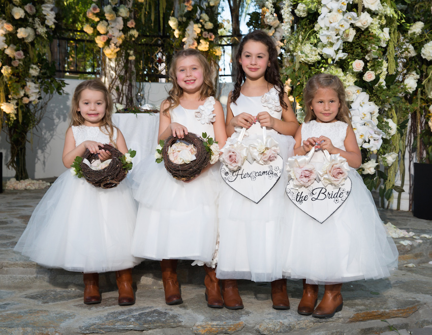 bridal party with flower girl