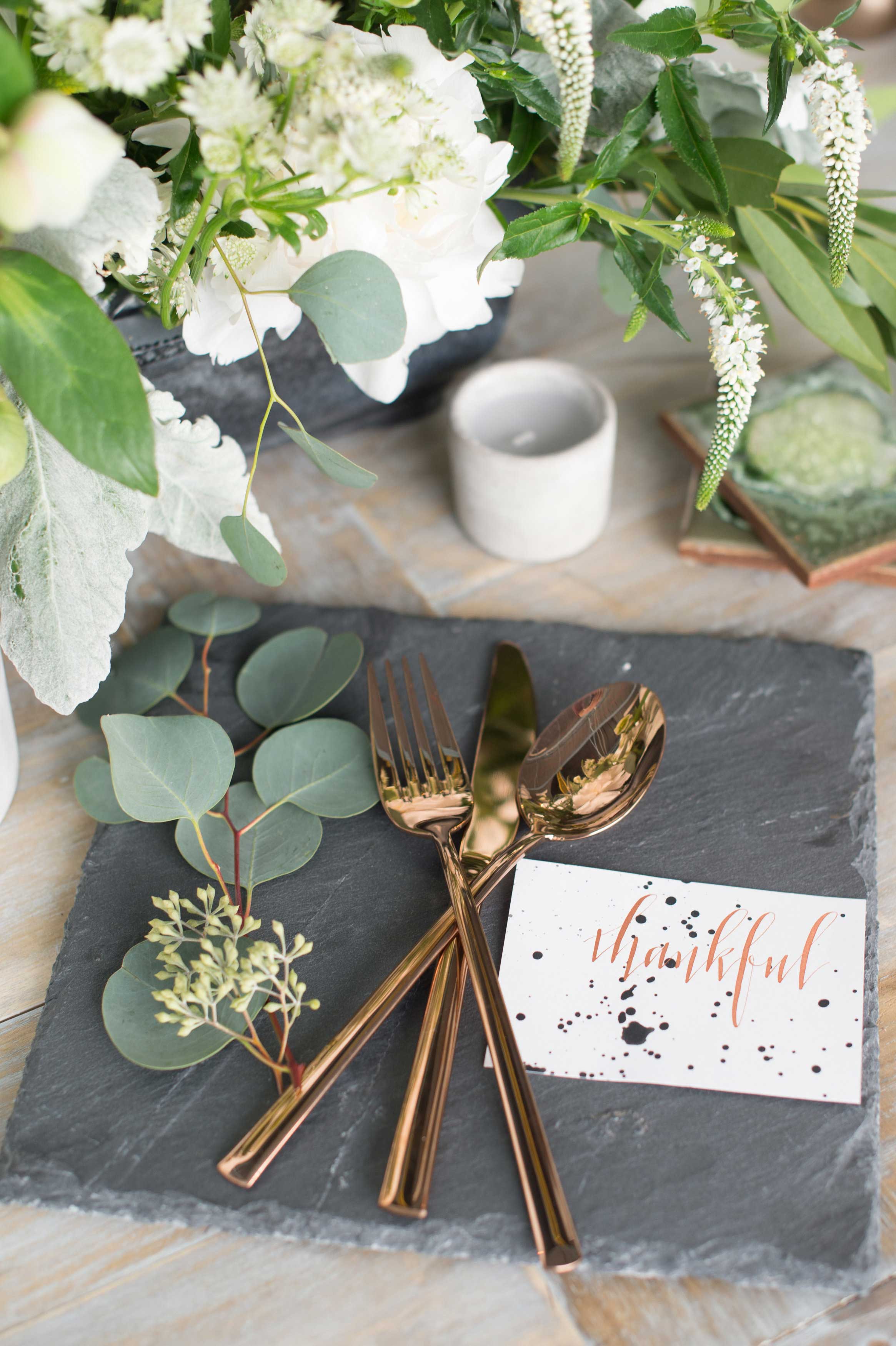 EVOKE DC Modern Whimsy wedding ideas slate stand with rose gold flatware fork knife spoon