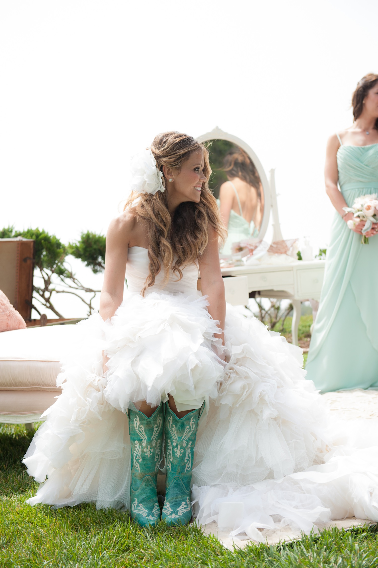 wedding dress and cowgirl boots