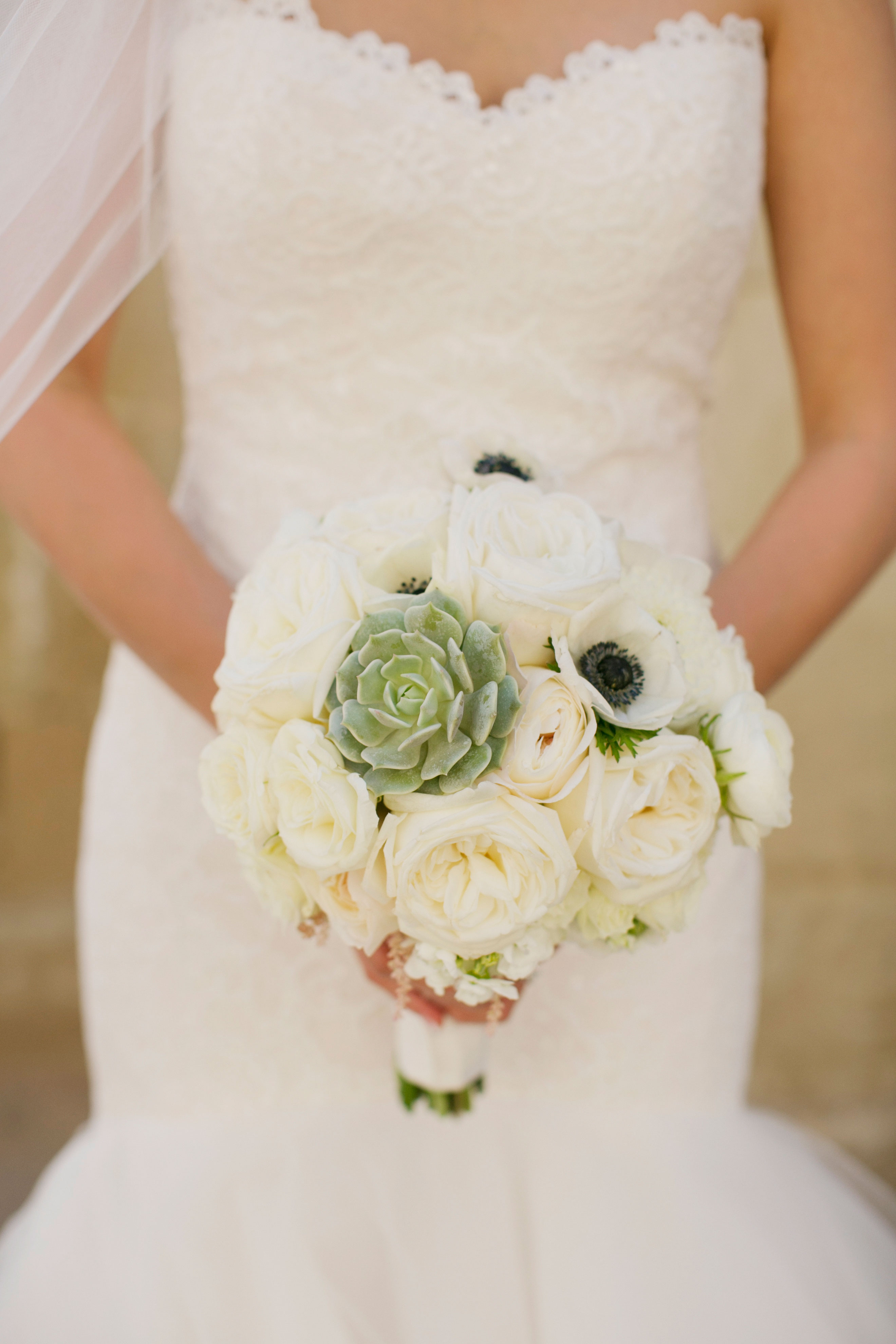modern white bridal bouquet with garden roses and succulent