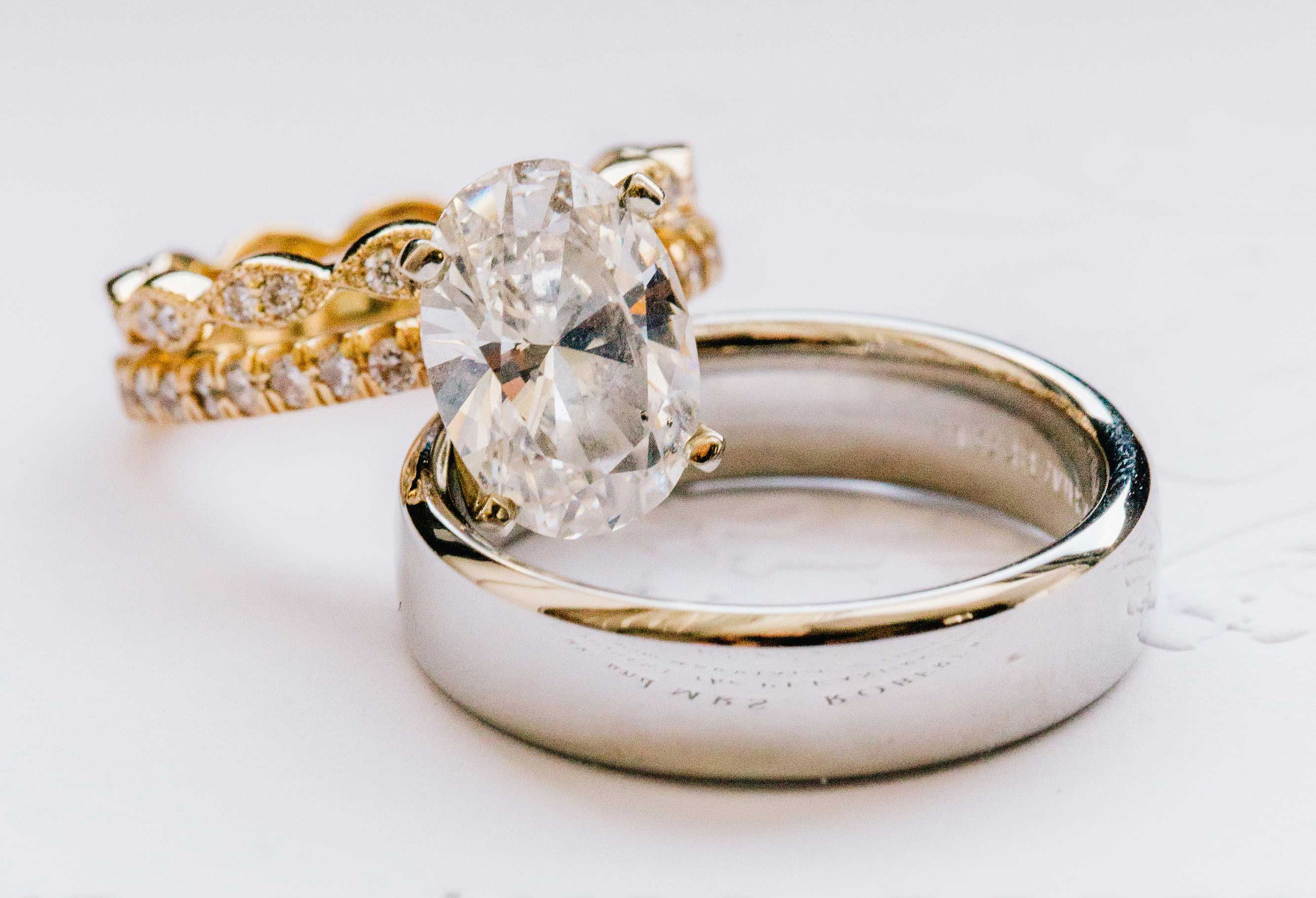 diamond oval engagement ring, yellow gold pavé band