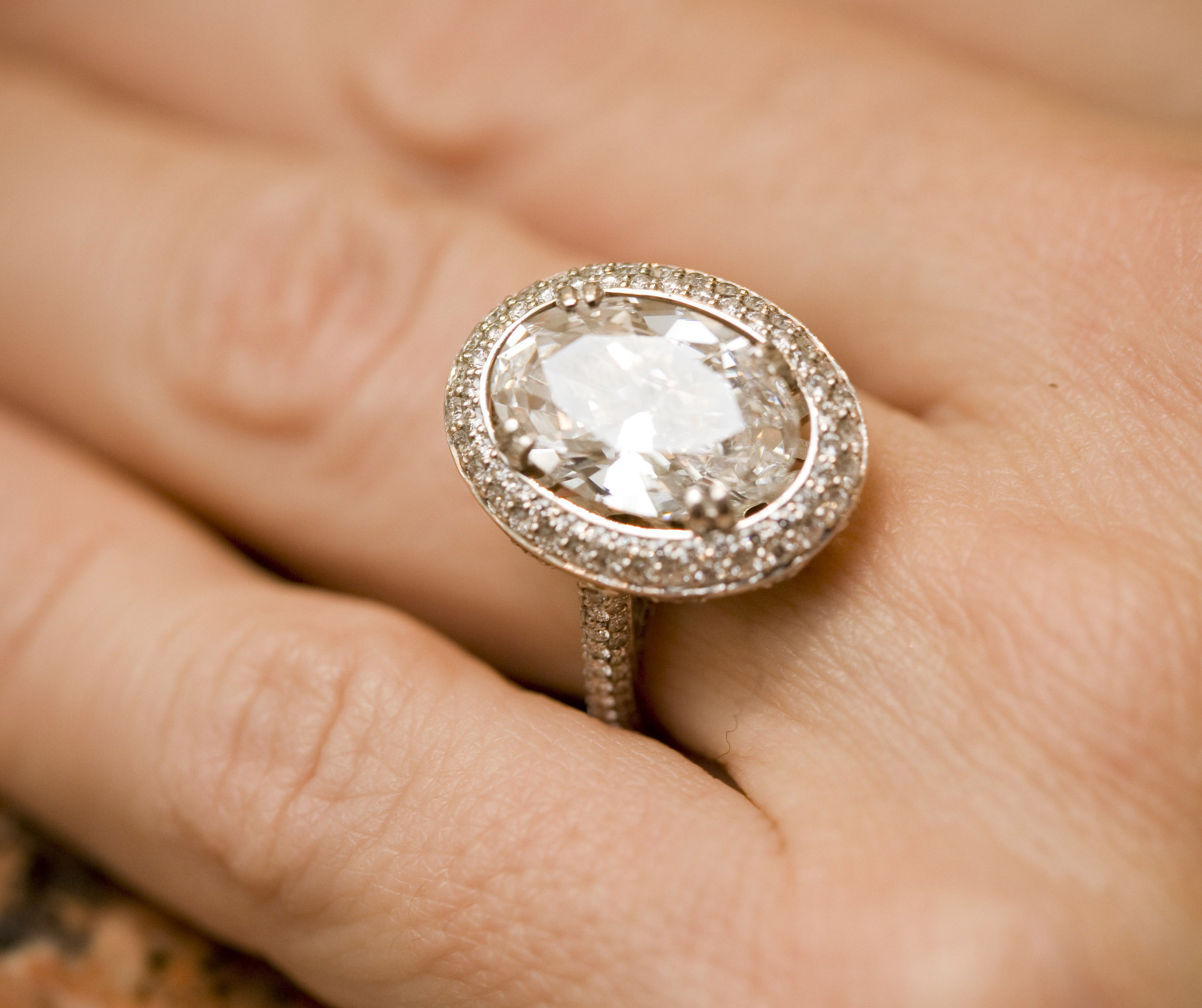 oval diamond halo engagement ring white gold