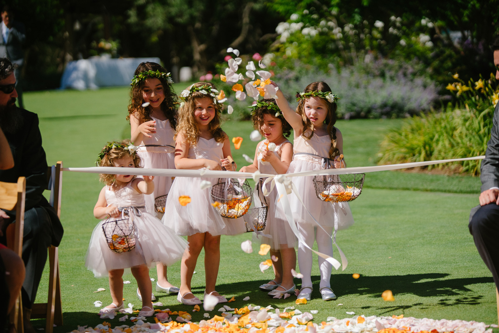 flower girl throwing flowers